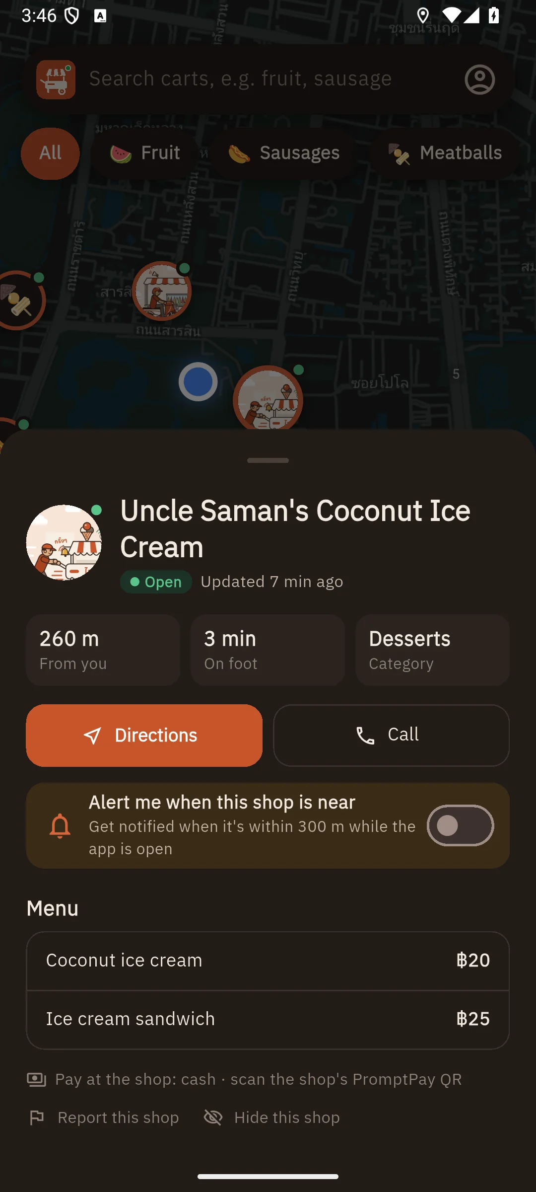 Ice cream cart shop page in night mode, with report and hide buttons